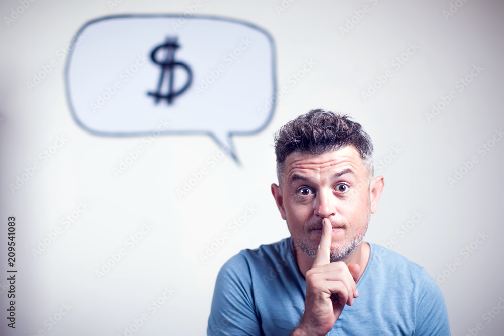 Portrait of a young man with a speech bubble dollar signe over his head Portrait of a young man with a speech bubble dollar signe over his head