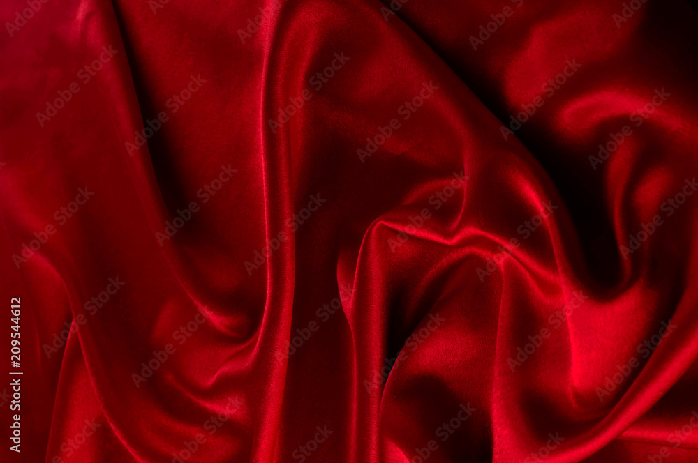 Abstract silk luxury background, piece of cloth, deep red cloth texture Abstract silk luxury background, piece of cloth, deep red cloth texture