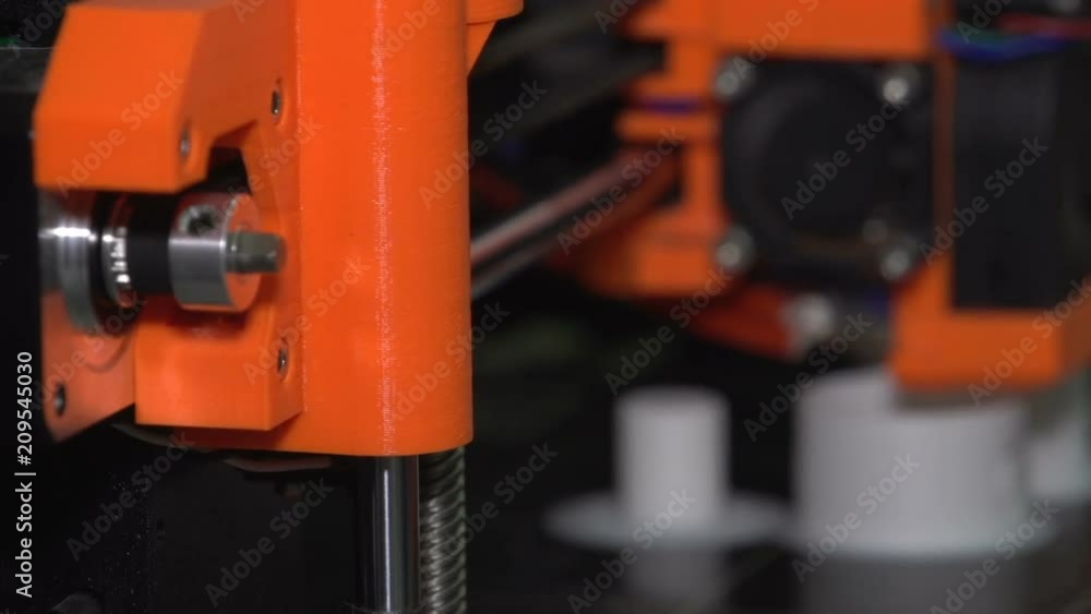 3D printer. Hi-tech technology. high tech. 3D printing plastic part, detail. Computer software device. Plastic model.Change focus. 10 3D printer. Hi-tech technology. high tech. 3D printing plastic part, detail. Computer software device. Plastic model.Change focus. 10