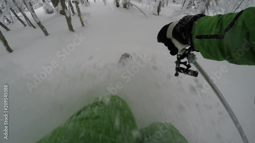  gopro chest mount skier  extreme in forest  skiing on fresh powder snow at winter