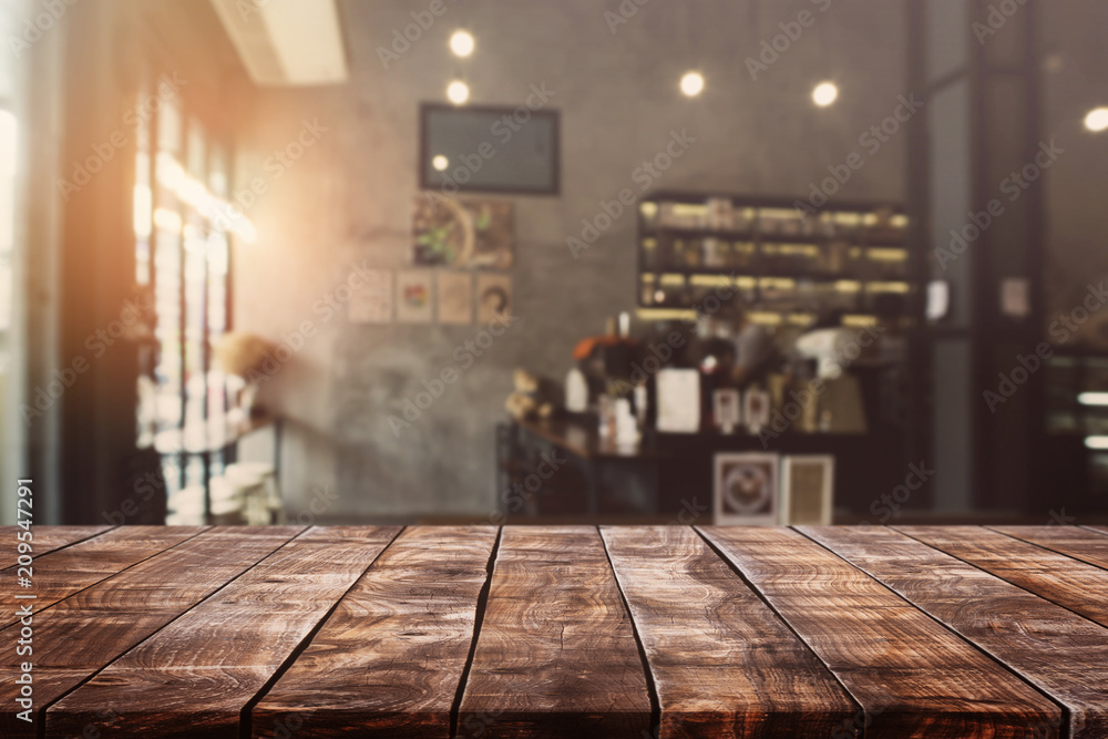 Empty old wood table top and blurred bokeh cafe and coffee shop interior  background with vintage filter - can used for display or montage your  products. Stock Photo | Adobe Stock