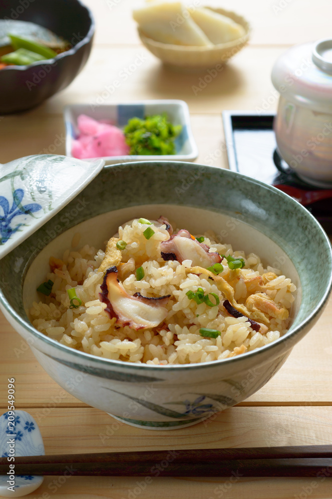 Takikomi gohan is a Japanese rice dish seasoned with dashi and soy sauce along with mushrooms, vegetables, meat, or fish. Takikomi gohan is a Japanese rice dish seasoned with dashi and soy sauce along with mushrooms, vegetables, meat, or fish.