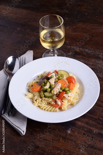 Fusilli pasta dish with organic seasoning 