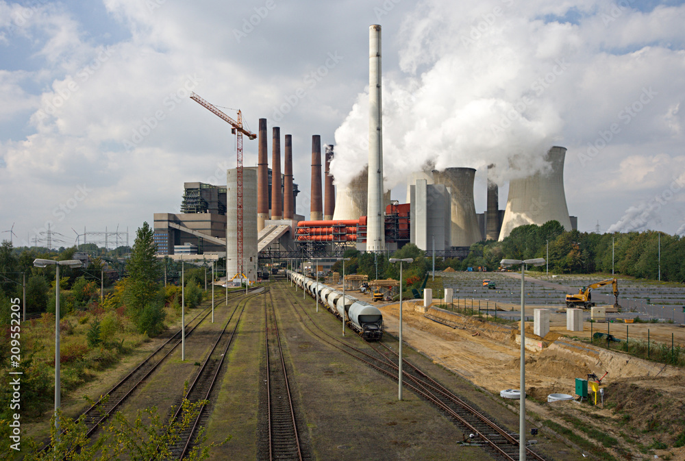 Obraz premium Power Plant And Railroad Tracks