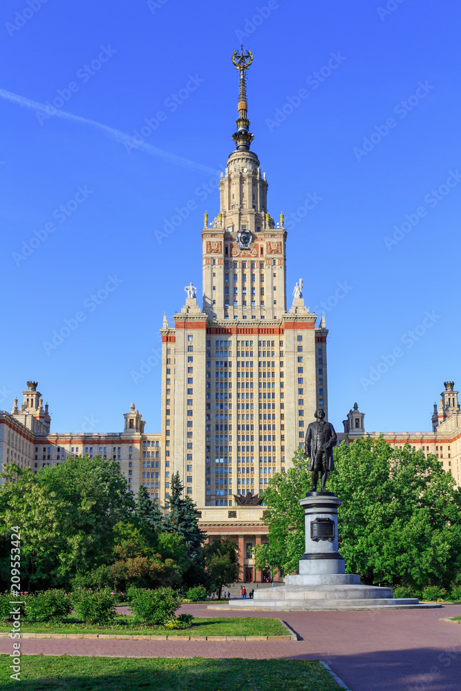 View of Moscow State University (MSU) against Monument to Lomonosov in sunny summer evening