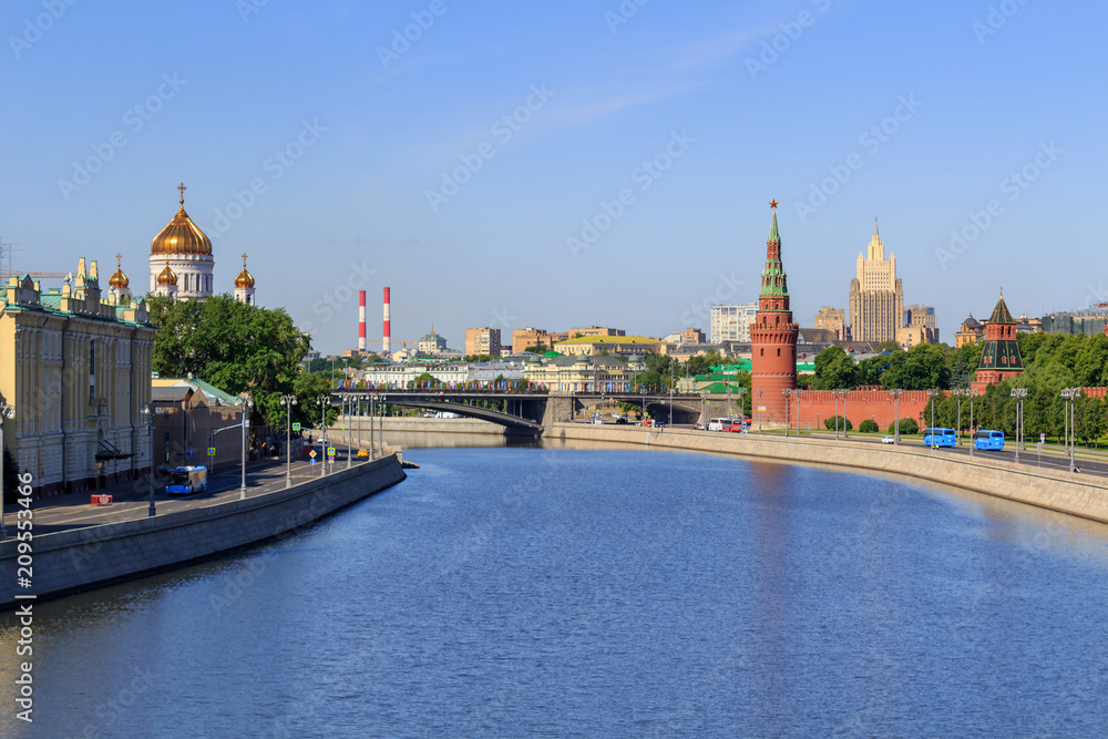 View of Moskva river with Moscow Kremlin and Cathedral of Christ the Saviour in sunny summer morning