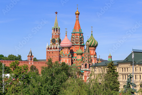 St. Basil's Cathedral with Moscow Kremlin on a blue sky background. View from Zaryadye Park