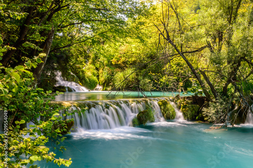 Long exposure of a small waterfall in Plitvice lakes during the day, Croatia