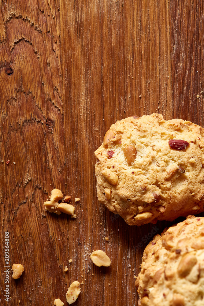 Bunch of chocolate biscuits on a rustic wooden background, close-up, selective focus. Bunch of chocolate biscuits on a rustic wooden background, close-up, selective focus.