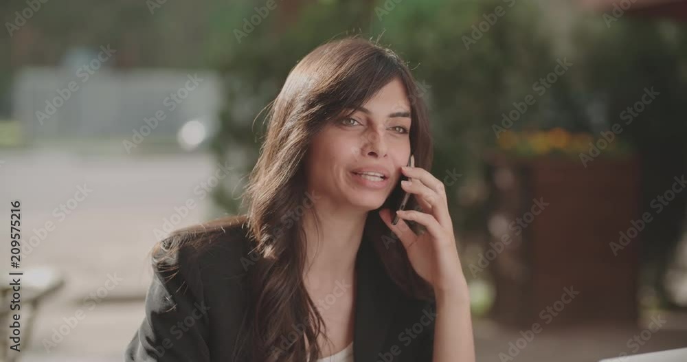 young female freelancer working in cafe outdoors 4k young female freelancer working in cafe outdoors 4k