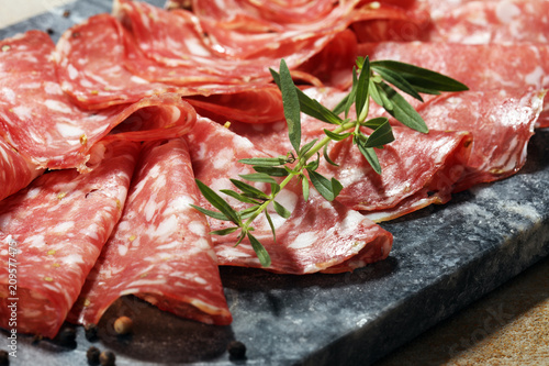 thinly sliced salami . delicious snack rustic salami