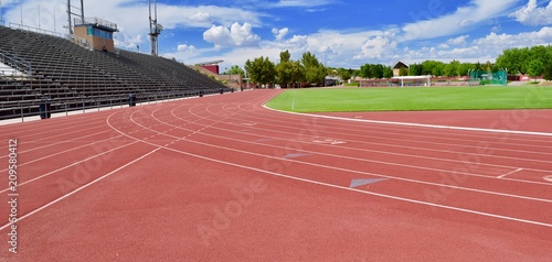 Red track at stadium photo
