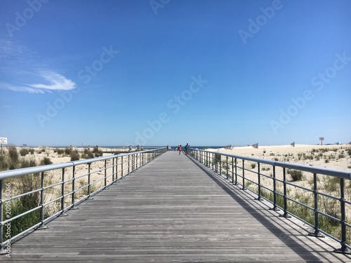 A boardwalk leading to the beach at Robert Moses State Park on Fire Island  New York