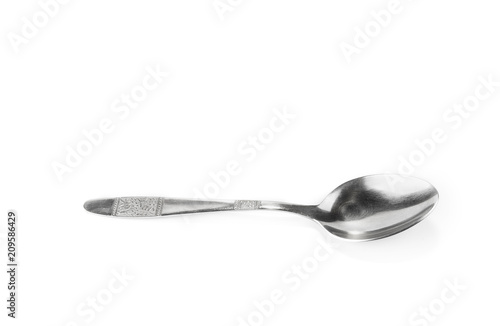 Soup spoon isolated in the white background