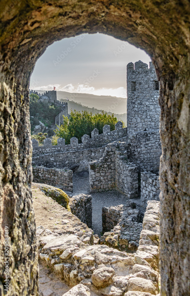 Castle wall across the mountain, entrance frame