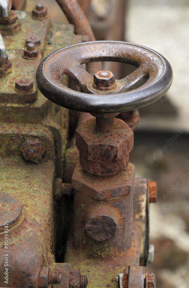 Valve wheel in abandoned steel factory Valve wheel in abandoned steel factory