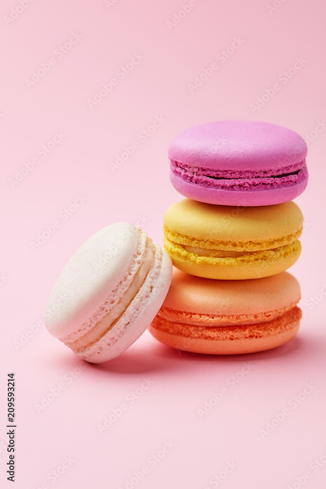 Macarons. Colorful Macaroons On Pink Background Macarons. Colorful Macaroons On Pink Background