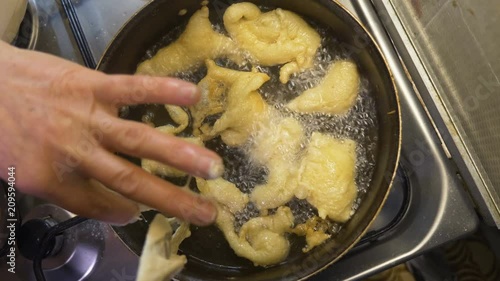typical Italian cuisine: frying pettole photo
