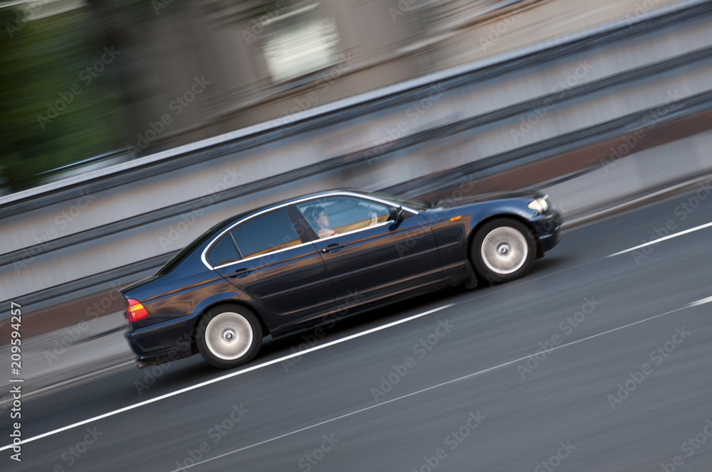 The car goes at high speed with blur The car goes at high speed with blur