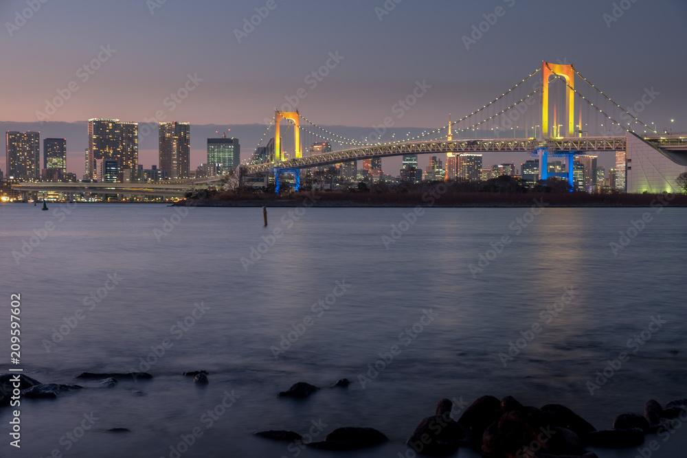 Rainbow bridge at sunset tokyo Japan