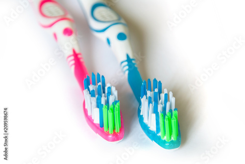 Two toothbrushes isolated on white background