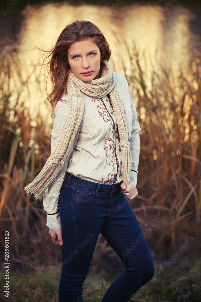 Young fashion girl in white shirt and scarf walking outdoor Young fashion girl in white shirt and scarf walking outdoor