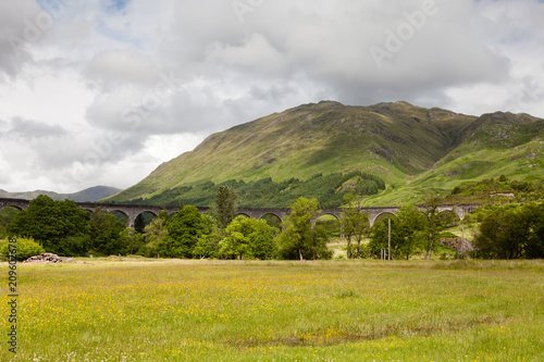 Glenfinnan Viaduct. A view of Glenfinnan Viaduct on the West Highland Line in Scotland between Fort William and Mallaig. The railway viaduct has featured in numerous films and television programmes.
