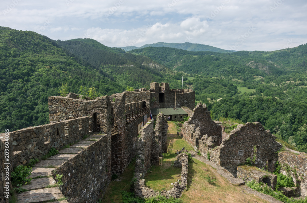 On the wall of medieval fortress Maglic, mountain range at background , Serbia