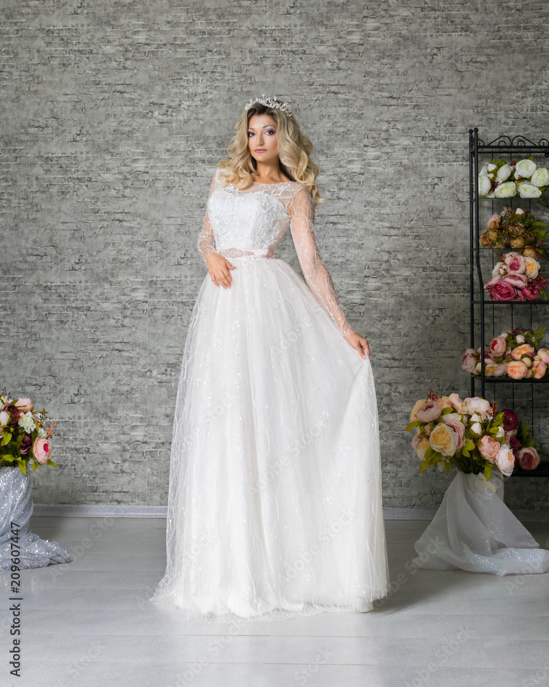 The girl in a fashionable wedding dress