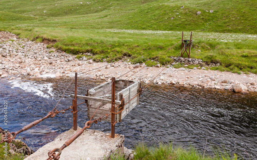 Sheep Transporter. A sheep transporter is pictured crossing the River Etive in Glen Etive, a glen in the Scottish Highlands. Sheep Transporter. A sheep transporter is pictured crossing the River Etive in Glen Etive, a glen in the Scottish Highlands.