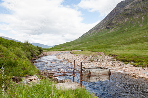 Sheep Transporter.  A sheep transporter is pictured crossing the River Etive in Glen Etive, a glen in the Scottish Highlands. photo