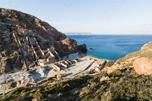 Abandoned sulfur mines on the coast of Aegean sea on Milos island, Greece photo