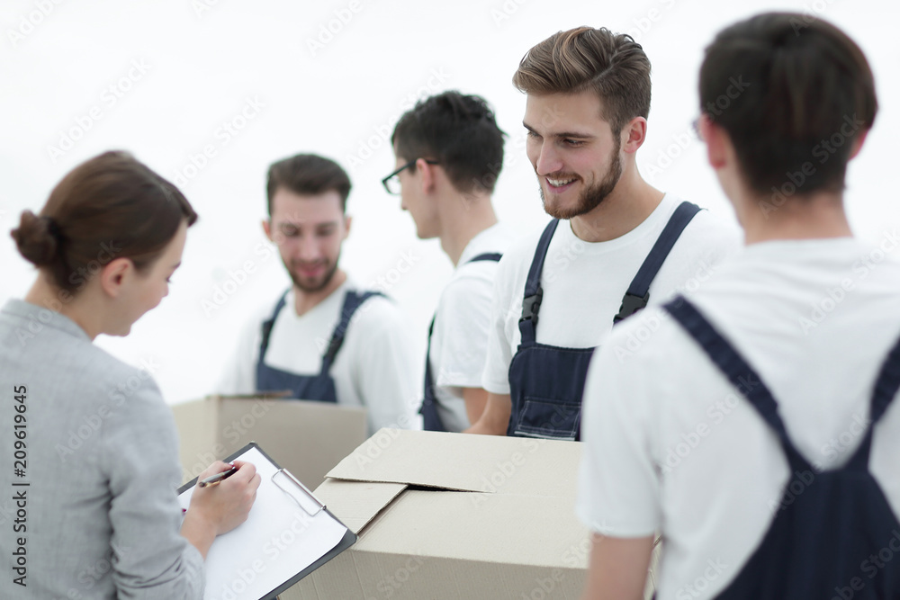 Manager and movers isolated on white background. Manager and movers isolated on white background.