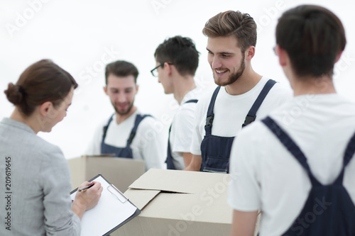 Manager and movers isolated on white background.