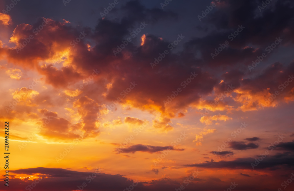 Colorful sunset with clouds. Beautiful evening background. Compositions of nature