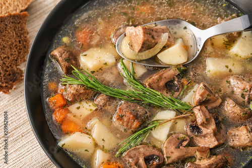 Plate with stewed meat and potatoes, closeup