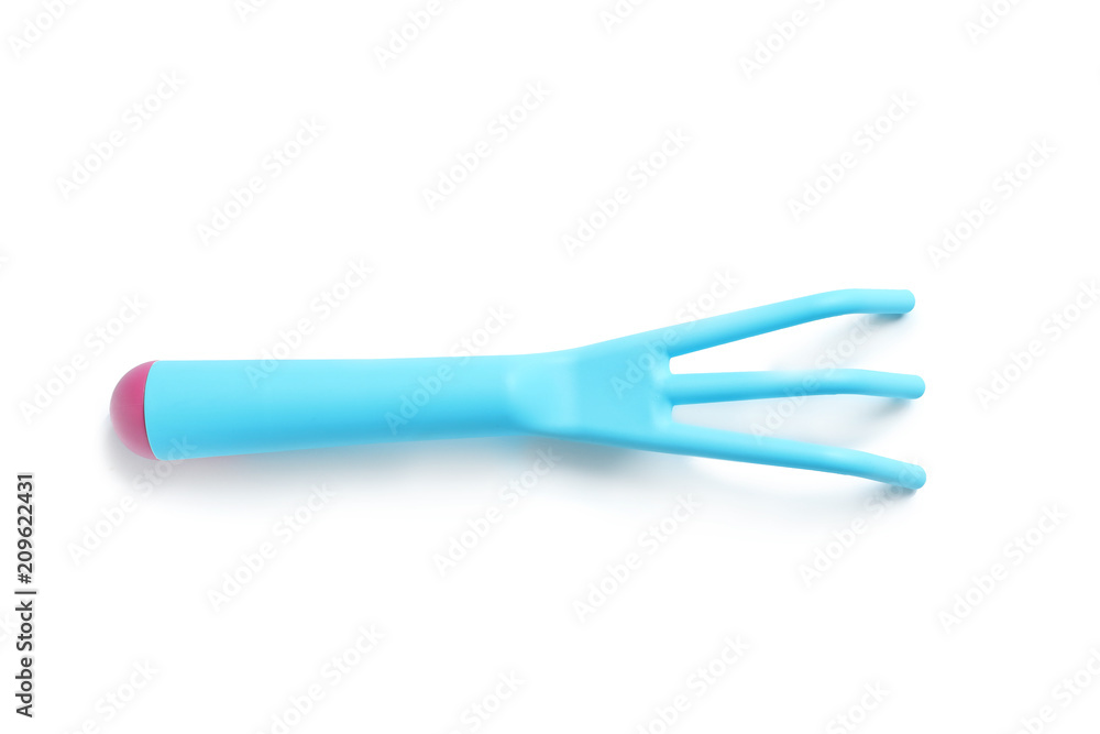 New rake on white background. Professional gardening tool New rake on white background. Professional gardening tool