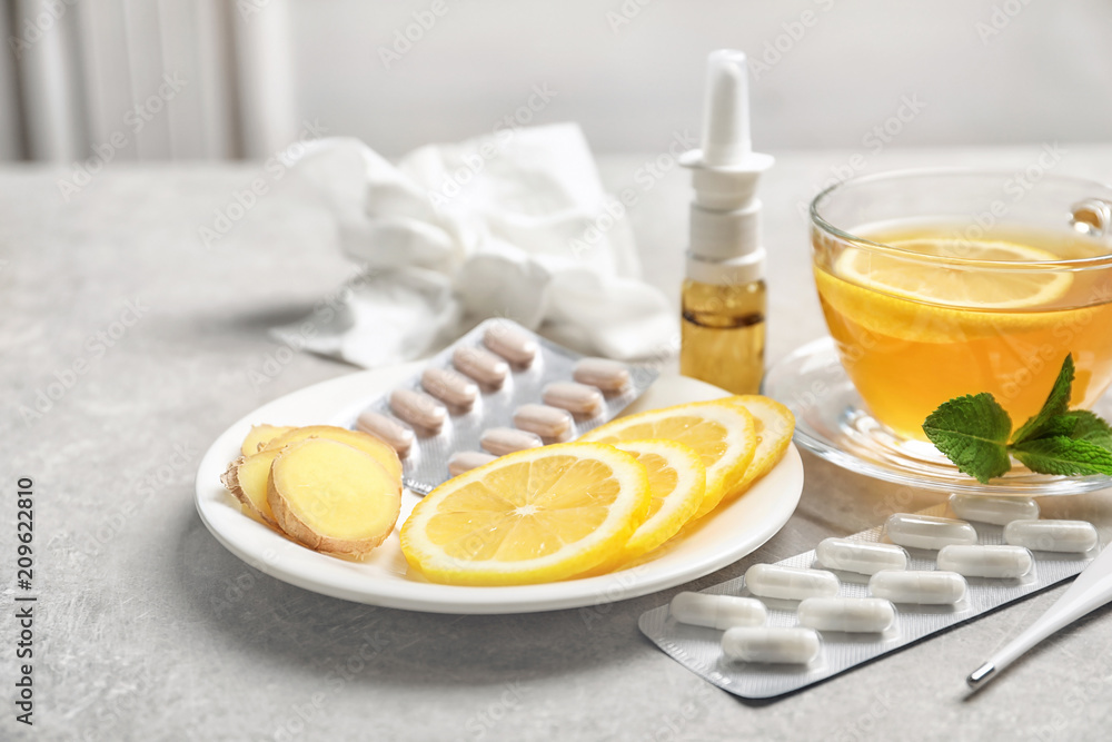 Natural and medical cold remedies on table Natural and medical cold remedies on table