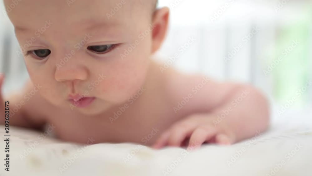 Close Up Baby Playing in Crib, with Audio