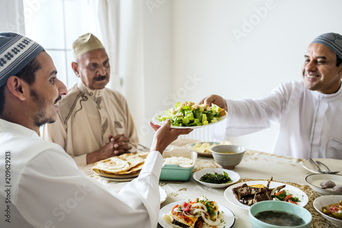 Muslim family having a Ramadan feast photo