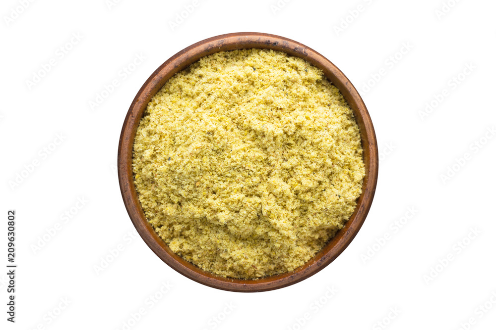 mustard powder spice in wooden bowl, isolated on white background. Seasoning top view mustard powder spice in wooden bowl, isolated on white background. Seasoning top view