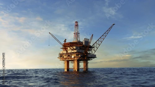 Offshore platform or oil rig in the open ocean producing natural gas for energy.