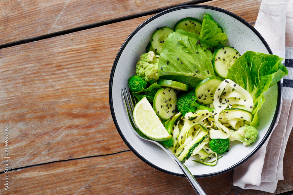 Bowl green salad with copy space top view Bowl green salad with copy space top view