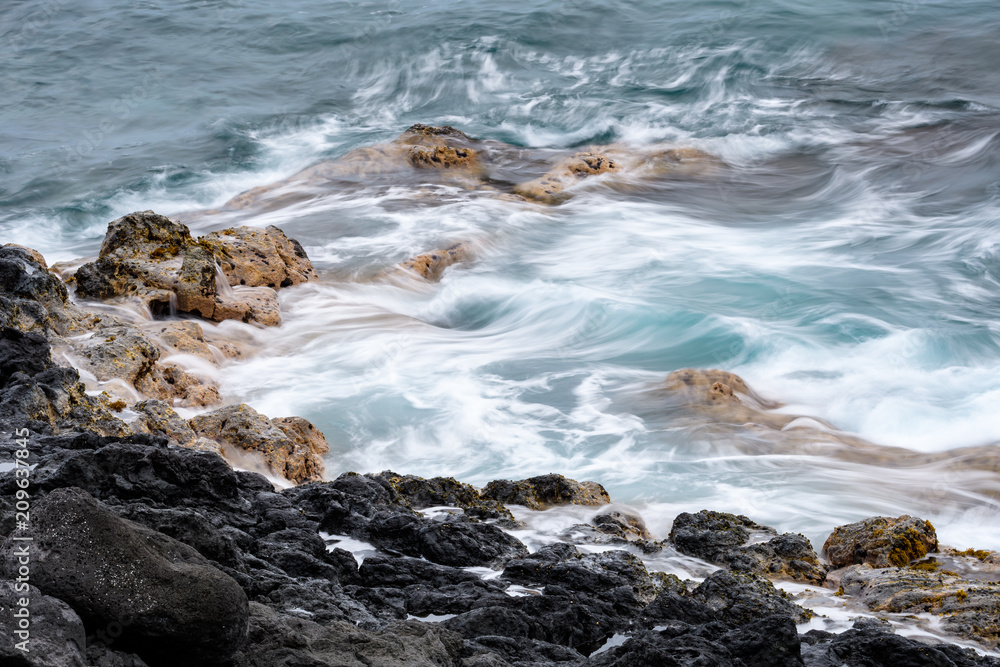 Blurred water with a slow shutter speed, lava shoreline of the Pacific Ocean, Hawaii
Blurred water with a slow shutter speed, lava shoreline of the Pacific Ocean, Hawaii