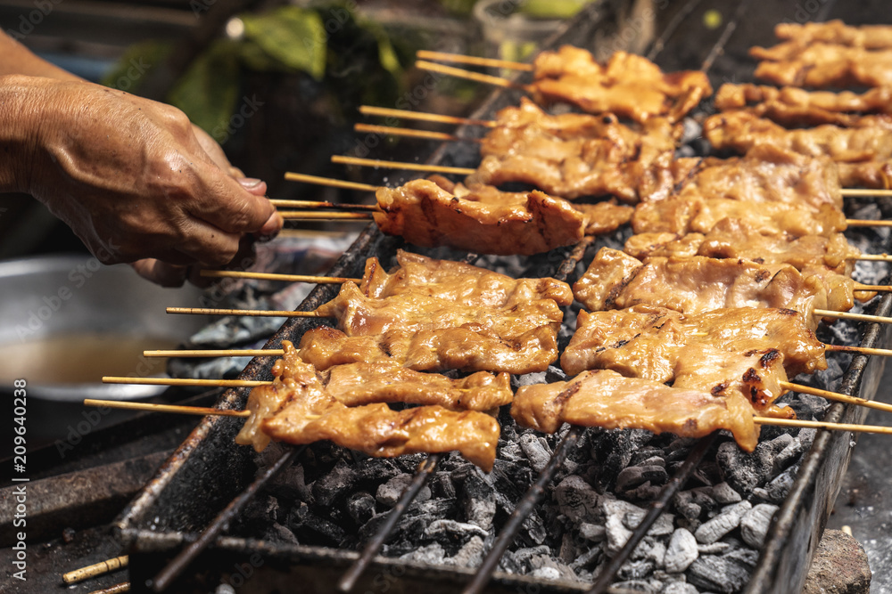Ταπετσαρία Tasty charcoal grilled pork skewer sticks sizzling on the bbq grill outdoor,  mo