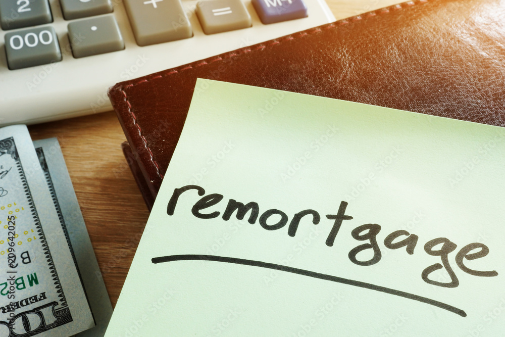 Remortgage concept. Memo stick, calculator and money. Stock Photo | Adobe  Stock