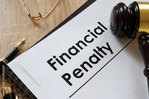 Φωτογραφία Documents about Financial penalty and gavel in the court.