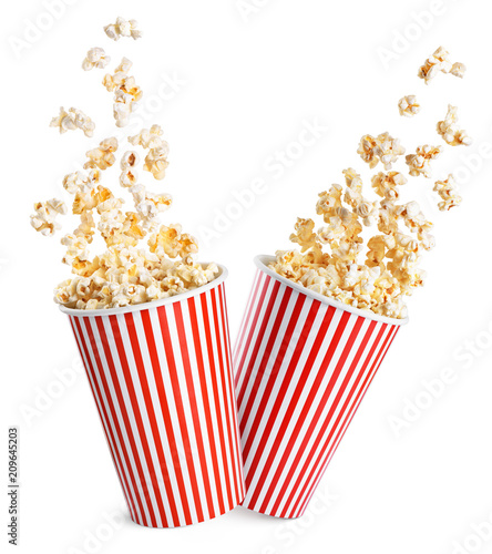 Falling popcorn in box isolated on a white background.