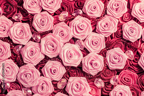Wedding background with red and light pink silky roses  decoration of the wedding party  delicate bride and bridesmaids texture