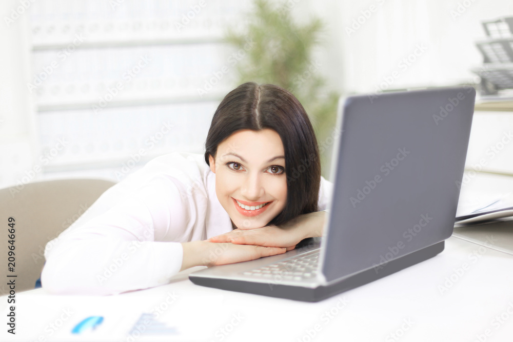 professional accountant with a laptop on workplace in the office professional accountant with a laptop on workplace in the office